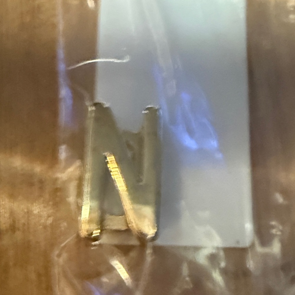 Gold letter “N” charm for keep collective